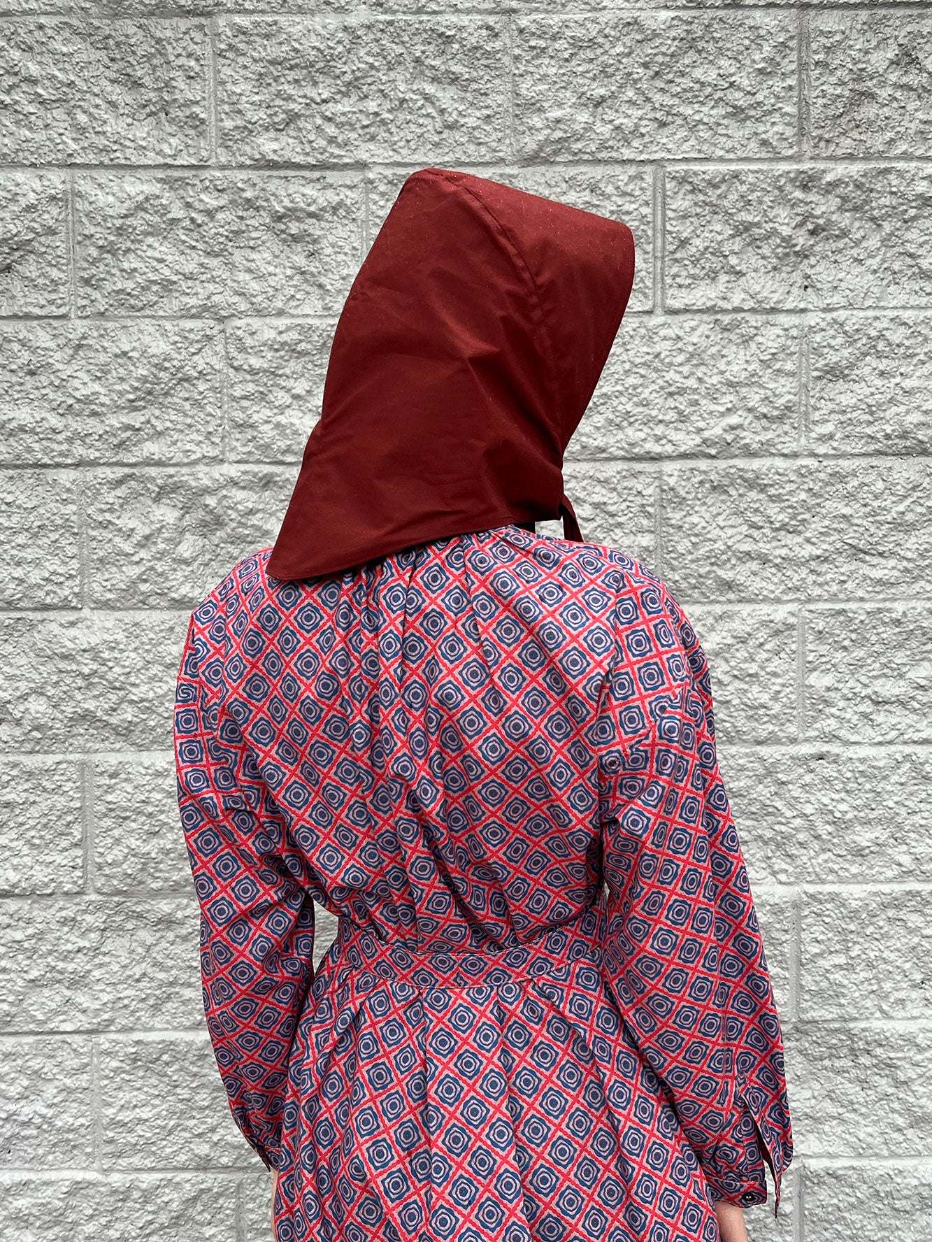 Nimbus Rain Bonnet in Garnet